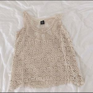 Cream colored Crochet lace overlay.